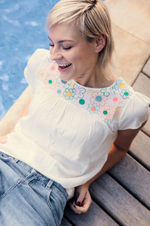 BROOK TUNIC TOP IN OFF-WHITE, RAINBOW FLOWERS